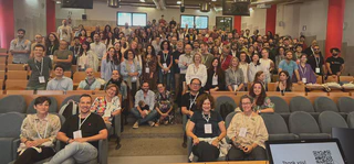 Group photo with the conference participants