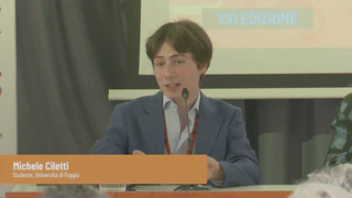 Michele Ciletti speaking at the panel